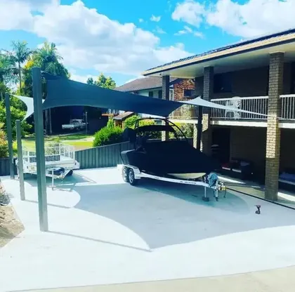 Custom boat cover and over-trailer shade structure built by North Coast Shade in Kempsey