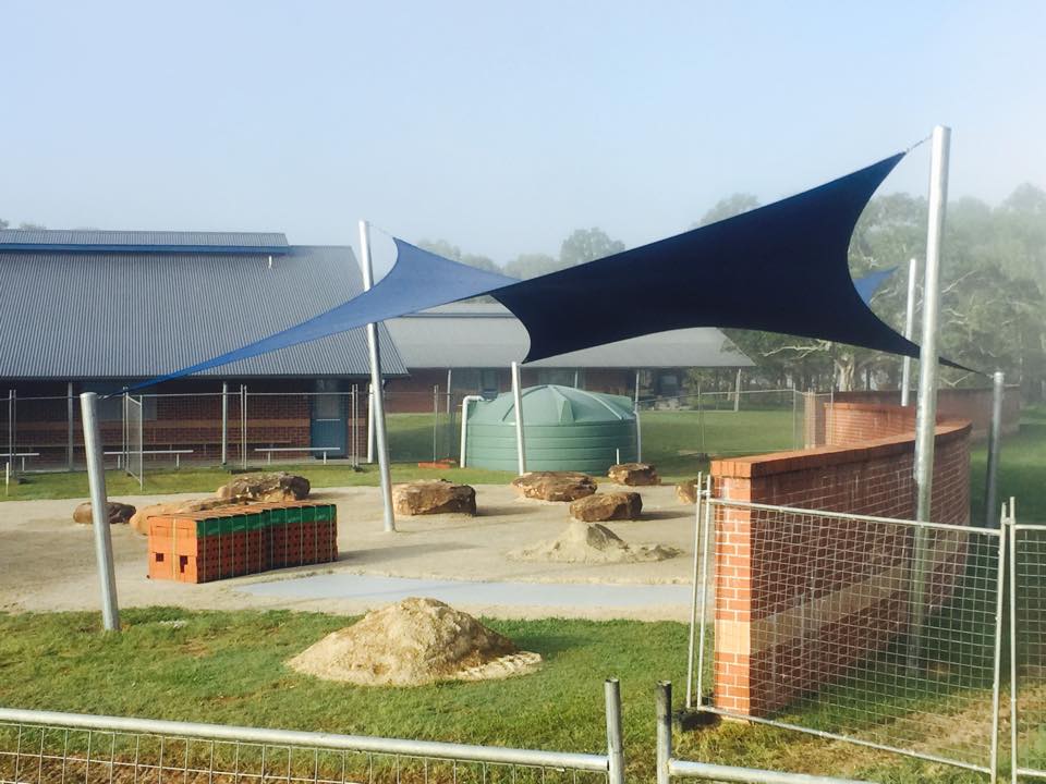 Heavy-duty commercial shade structure built for high-use outdoor environments